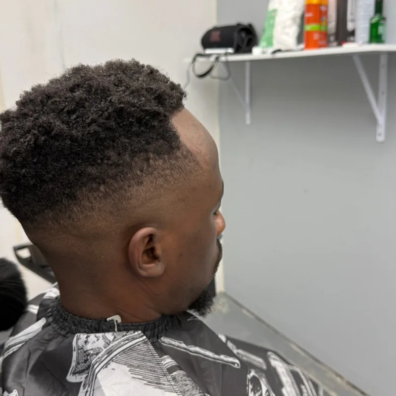 Men's fade haircut at DR COIFFURE hair salon Winnipeg